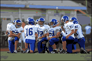 Football team huddle